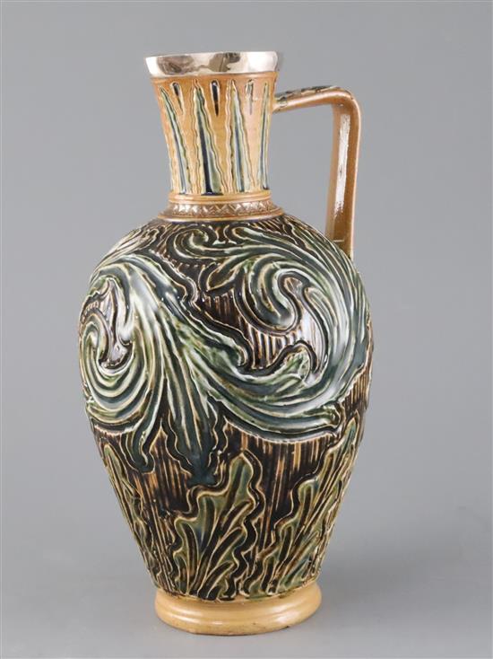 Arthur Barlow for Doulton Lambeth, an early ewer of scrolling leaf design, dated 1873, 28.5cm